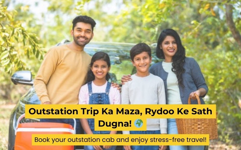 A smiling family of four stands beside a car packed for a getaway, trees framing the scene. The father, mother, daughter, and son hold a basket and cooler. Text reads "Outstation Trip Ka Maza, Rydoo Ke Sath Dugna!" and invites you to enhance your journey with RYDOO CAB Service today!.